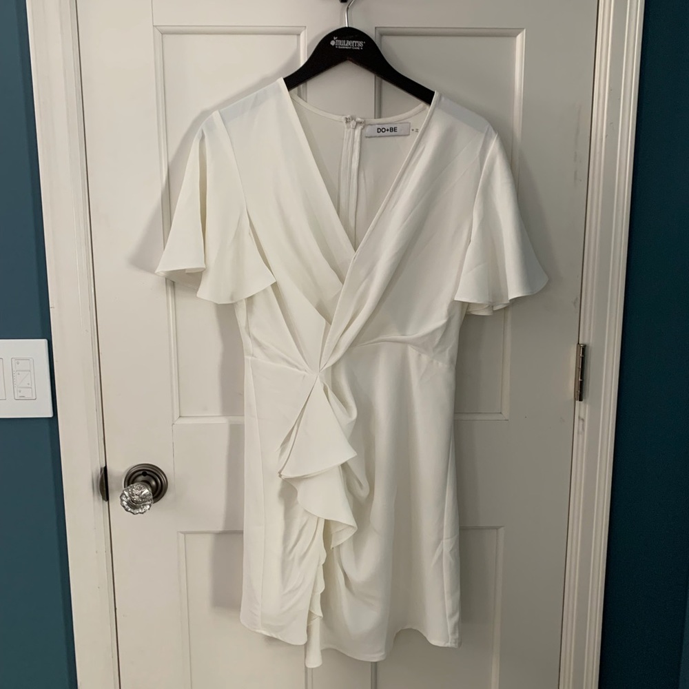Ivory flutter sleeve ruffle dress.
